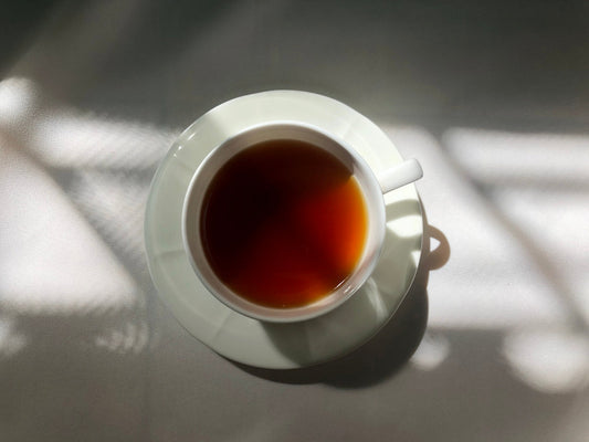 a cup of tea sitting on top of a table