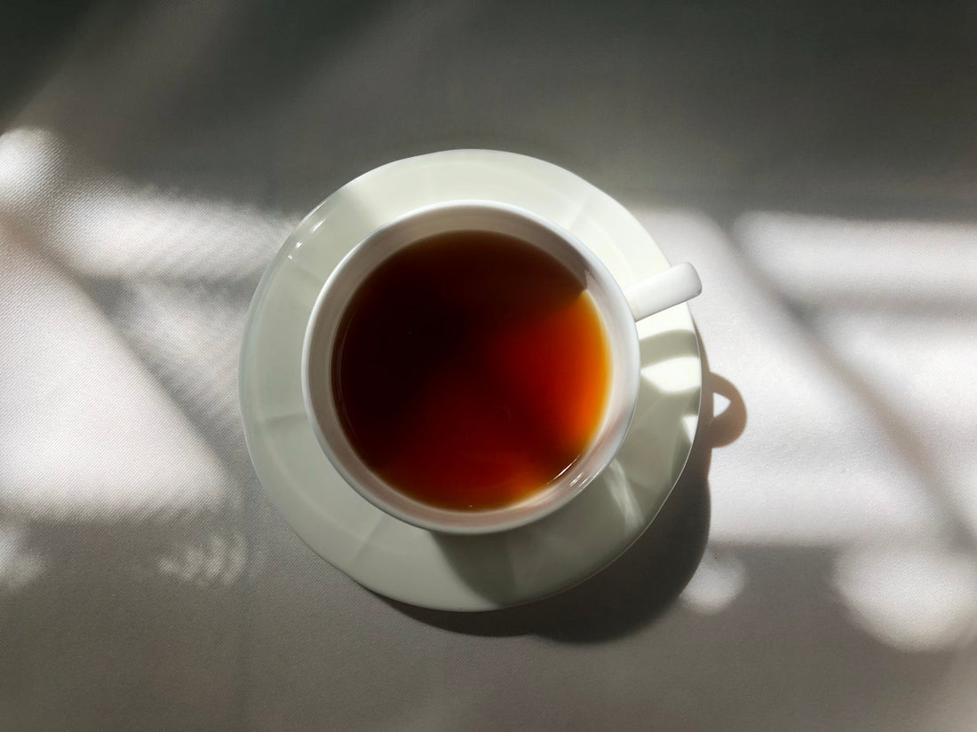 a cup of tea sitting on top of a table