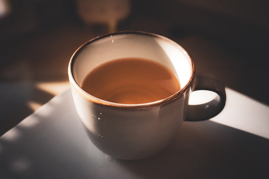 A cup of tea sitting on top of a table
