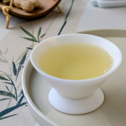 Pale green liquor of Liu An Gua Pian tea